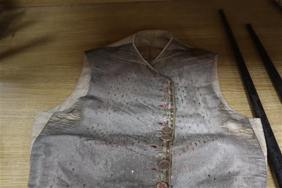 An 18th century gentlemans silver brocade and gold thread embroidered waistcoat